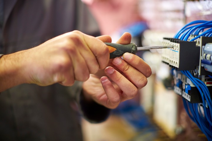 Close Up Of Electrician Working With Screw Driver 2026 01 05 01 12 23 Utc 1